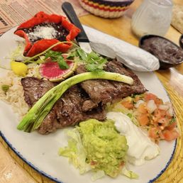 Barra Barra Saloon signature dishes Barra Barra Macho NachosChicken Mole Verde OaxacaFajita Parillada